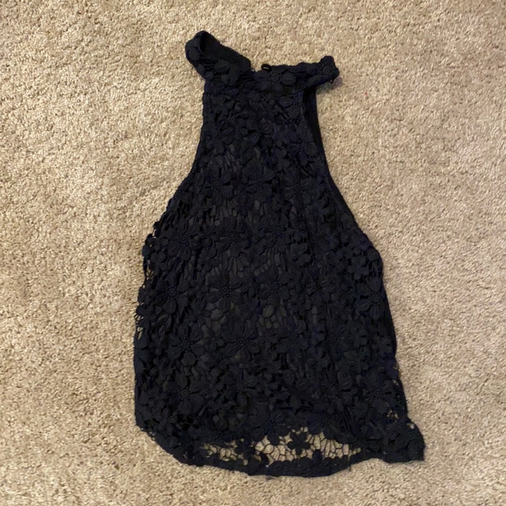 Open back black halter top with high neck and eye kit detail not sheer